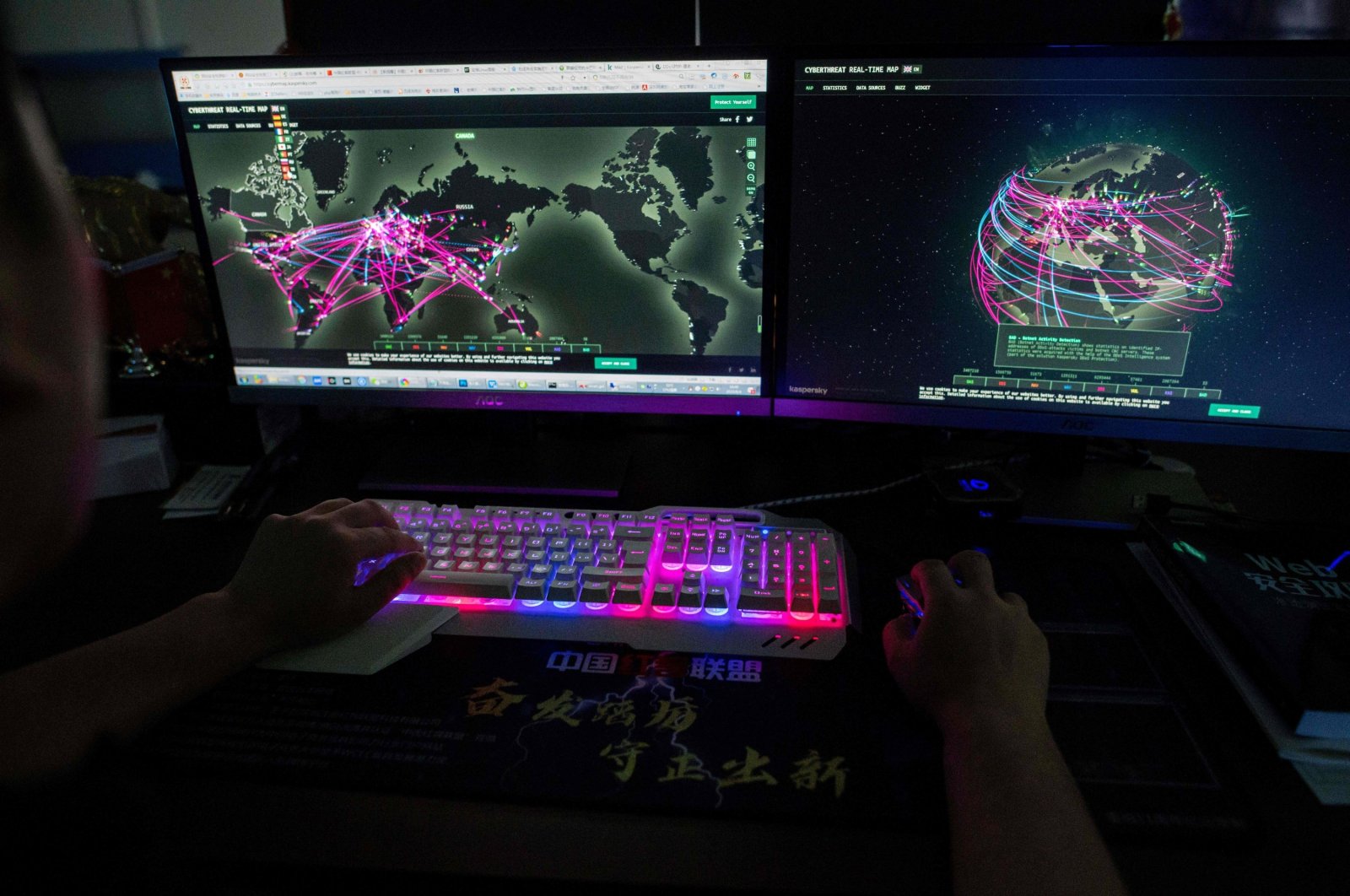 A hacker using a website that monitors global cyberattacks on his computer at their office in Dongguan, southern Guangdong province, China, Aug. 4, 2020. (AFP File Photo)