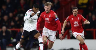 Manchester United's English striker Marcus Rashford (L) runs with the ball during the English League Cup semi-final first-leg football match between Nottingham Forest and Manchester United, at The City Ground stadium, Nottingham, UK., Jan. 25, 2023. (AFP Photo)