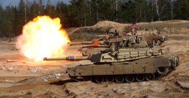 U.S. Army M1A1 Abrams tank fires during a NATO military exercise, Adazi, Latvia, March 26, 2021. (Reuters Photo)