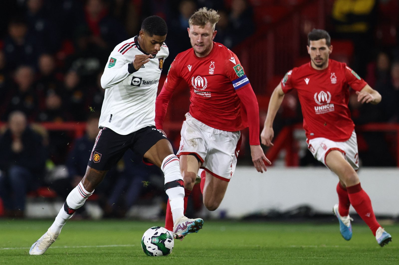 Manchester United&#039;s English striker Marcus Rashford (L) runs with the ball during the English League Cup semi-final first-leg football match between Nottingham Forest and Manchester United, at The City Ground stadium, Nottingham, UK., Jan. 25, 2023. (AFP Photo)