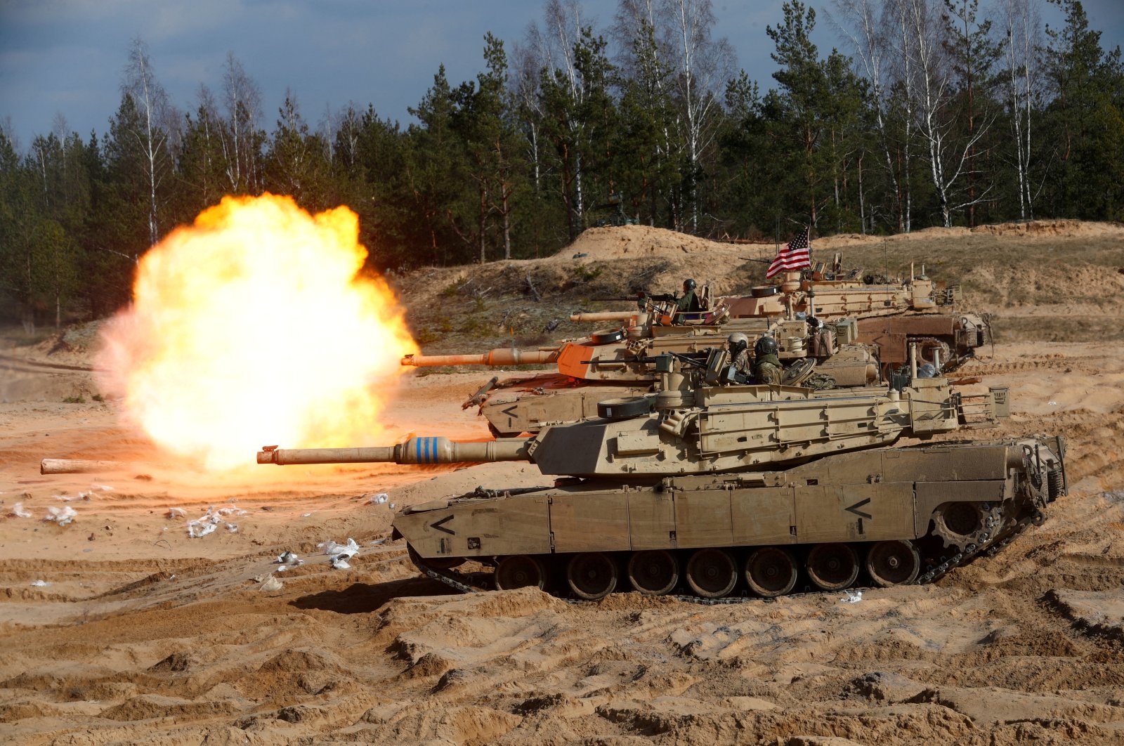 U.S. Army M1A1 Abrams tank fires during a NATO military exercise, Adazi, Latvia, March 26, 2021. (Reuters Photo)