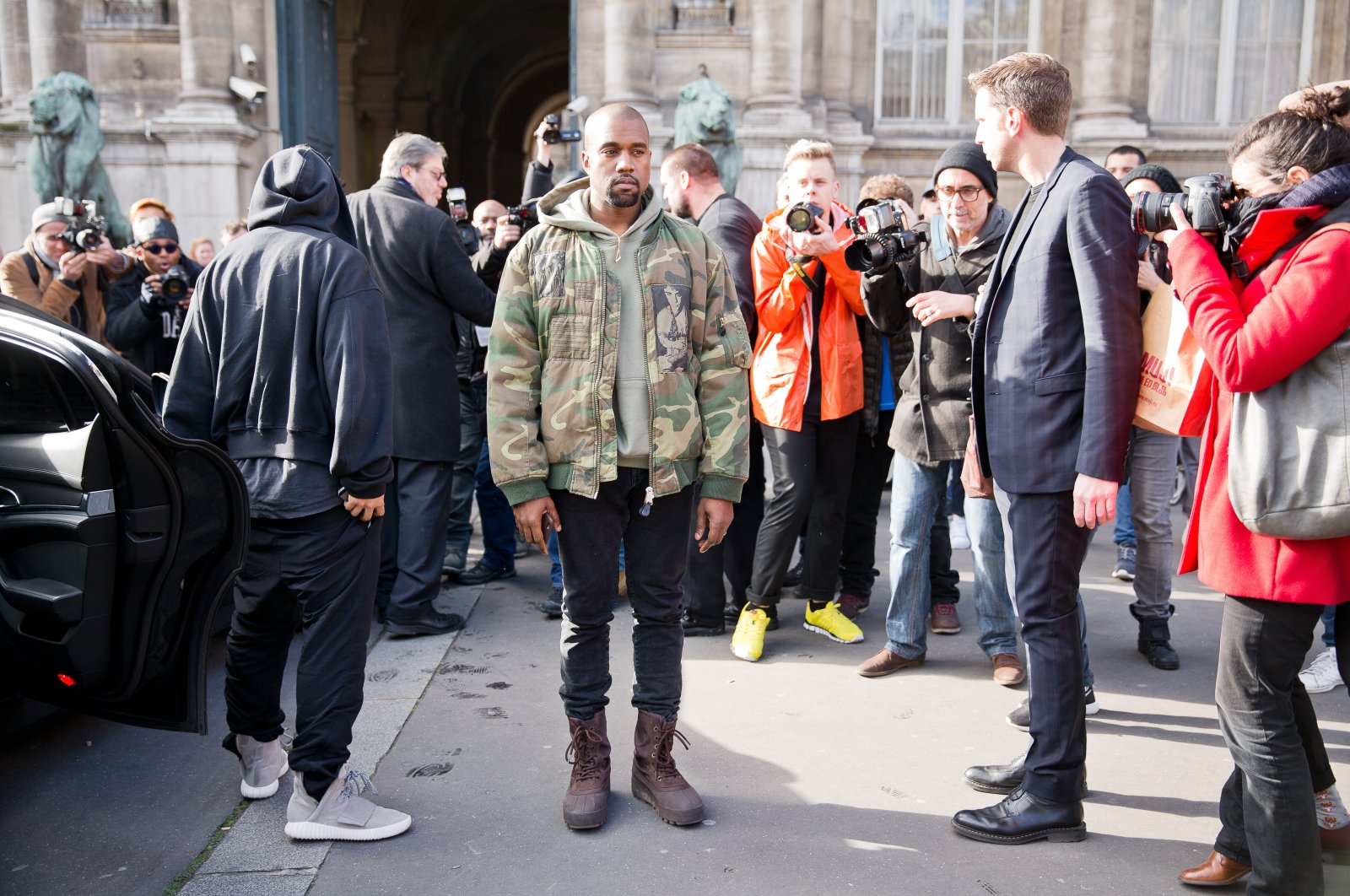 Kanye West posing for photographers in front of the Dries van noten fashion show, Paris, France, March 4, 2015. (Shutterstock Photo)