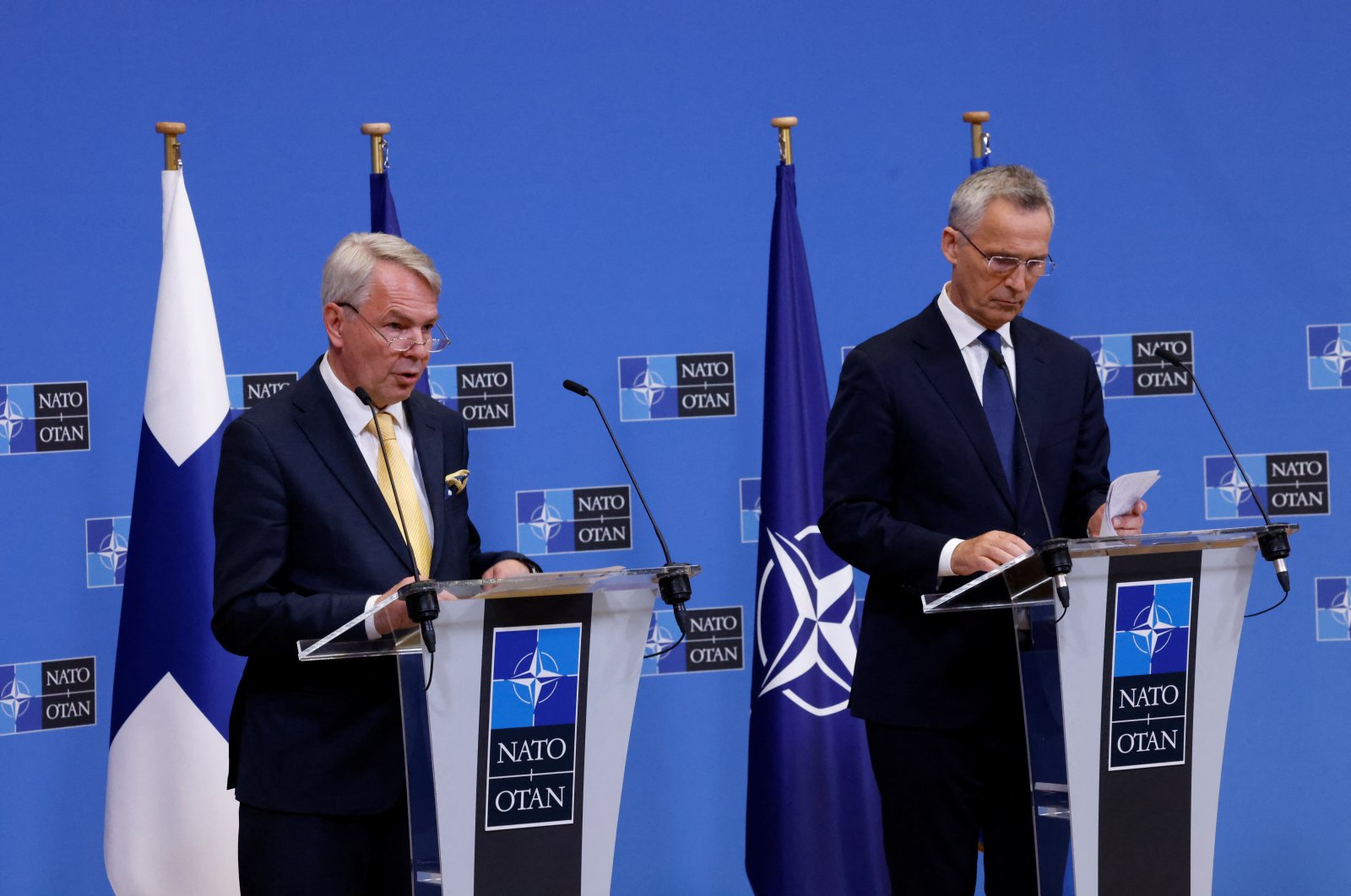 Finland&#039;s Foreign Minister Pekka Haavisto (L) and Sweden&#039;s Foreign Minister Ann Linde (not pictured) attend a news conference with NATO Secretary General Jens Stoltenberg (R), after signing their countries&#039; accession protocols at the alliance&#039;s headquarters in Brussels, Belgium July 5, 2022. (Reuters Photo)