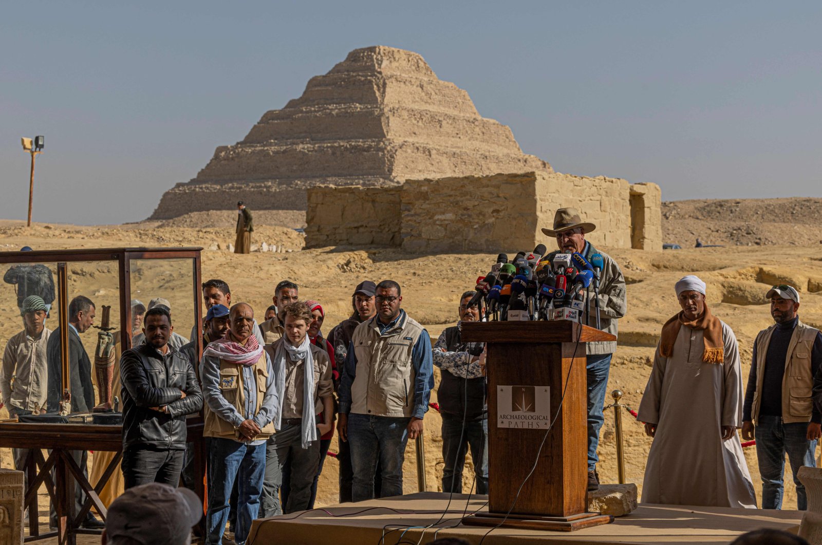 Archaeologist and Egypt&#039;s former antiquities minister Zahi Hawass holds a press conference in the Saqqara necropolis, where a gold-laced mummy and four tombs including of an ancient king&#039;s "secret keeper" were discovered, south of Cairo on Jan. 26, 2023. (AFP Photo)