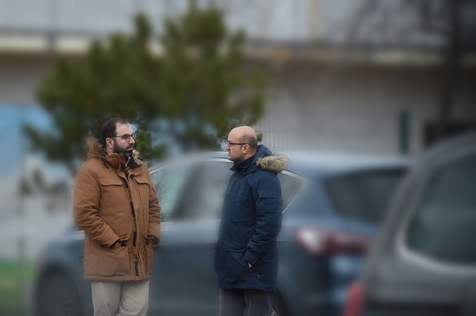Two members of the Gülenist Terror Group’s (FETÖ) wanted by Türkiye, Celal Fındık (L) and Ercan Karakoyun (R), are seen chatting on a street in Berlin, Germany, Jan. 26, 2023. (Photo by Abdurrahman Şimşek)