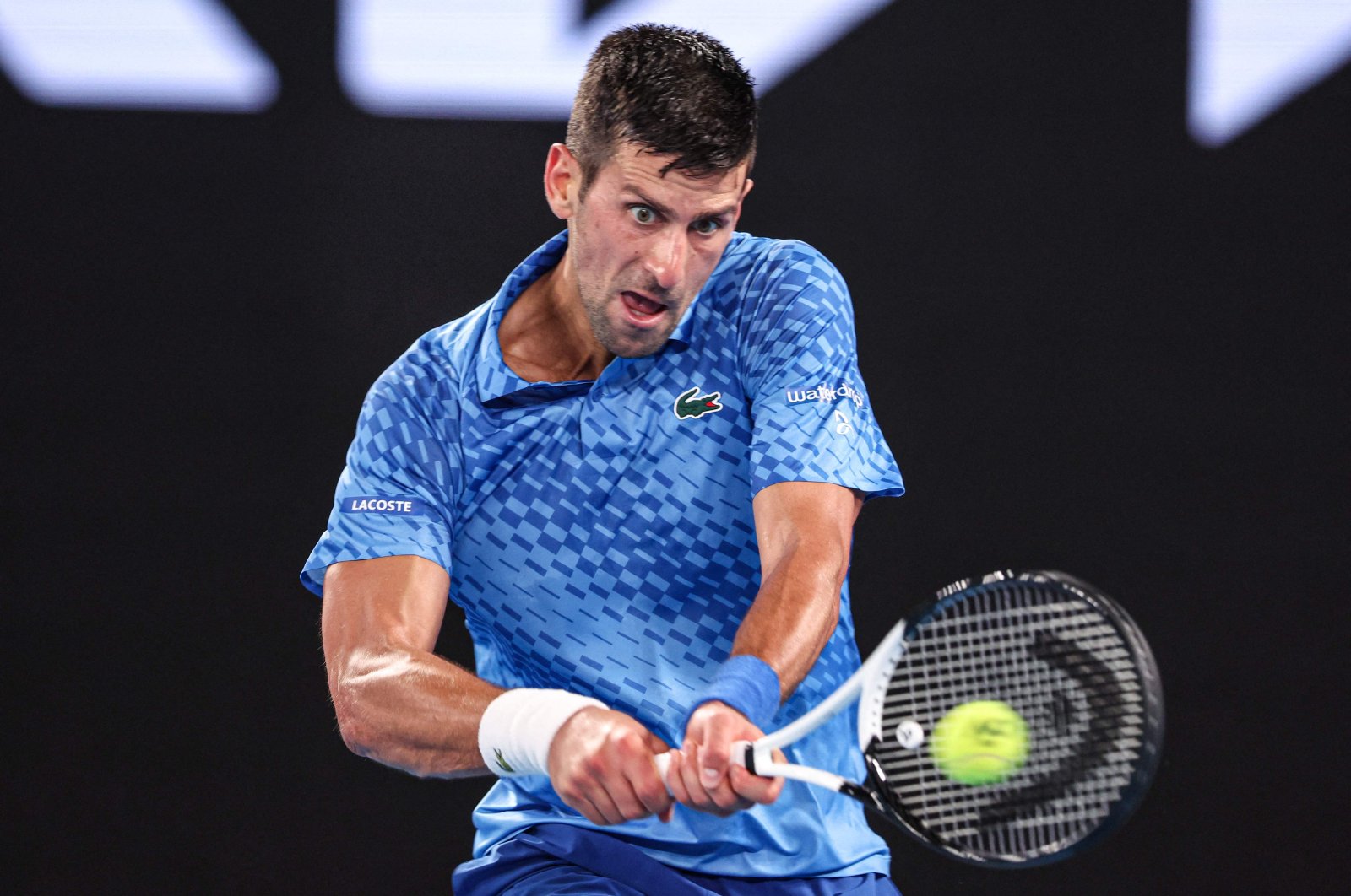 Serbia&#039;s Novak Djokovic hits a return against Tommy Paul of the U.S. during their men&#039;s singles semifinal match on Day 12 of the Australian Open tennis tournament, Melbourne, Australia, Jan. 27, 2023. (AFP Photo)
