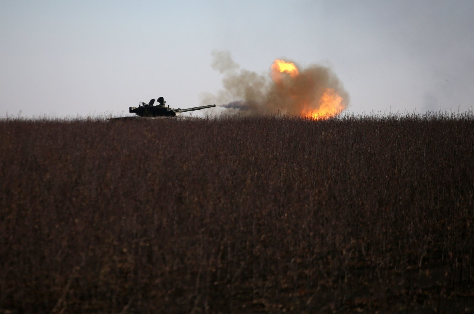 A Ukrainian tank fires toward a Russian position near the town of Bakhmut, Donetsk, Jan. 26, 2023. (AFP Photo)