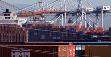 Stacked containers are shown as ships unload their cargo at the Port of Los Angeles in Los Angeles, California, U.S., Nov. 22, 2021. (Reuters Photo)