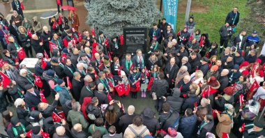 A group of citizens gather in Kocaeli on the occasion of the 35th anniversary of the resistance of Western Thracian Turks on Jan. 29, 1988. Citizens marching with flags and members of the protocol gave the message "We have not forgotten Jan. 29," Kocaeli, Türkiye, Jan. 29, 2023. (IHA Photo)