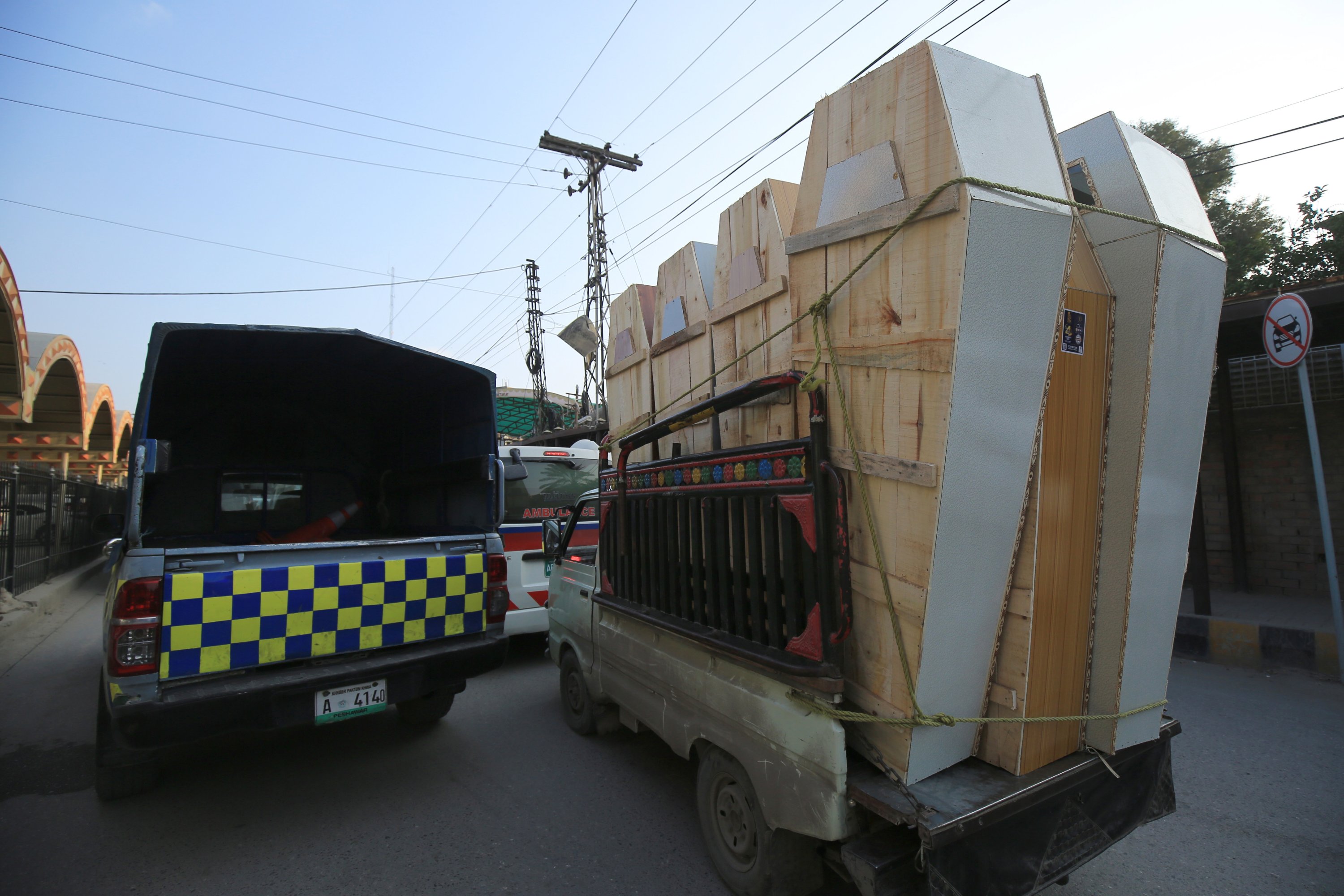 Coffins are transported to the scene of a blast at a Mosque, in Peshawar, Pakistan, Jan. 30, 2023. (EPA Photo)