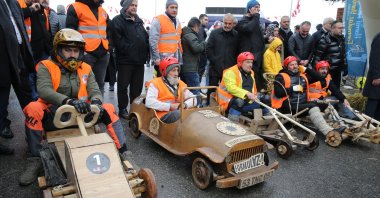 Wooden car racers wait at the Formulaz race starting point in front of the Alemdağ Culture Center, Istanbul, Türkiye, Jan. 29, 2023. (AA Photo)