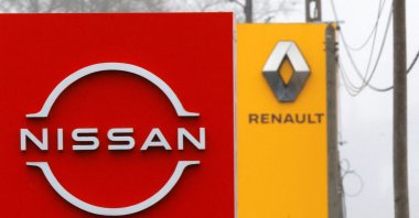 The logos of car manufacturers Nissan and Renault are seen in front of dealerships of the companies in Etampes, near Paris, France, Jan. 26, 2023. (Reuters Photo)