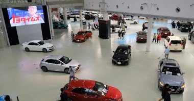 The photo taken on Feb. 6, 2019, shows people visiting a Toyota car showroom in Tokyo. - Japan's Toyota was the world's top-selling automaker in 2022, retaining its lead over German rival Volkswagen for the third year running, company data showed on Jan. 30, 2023. (AFP Photo)