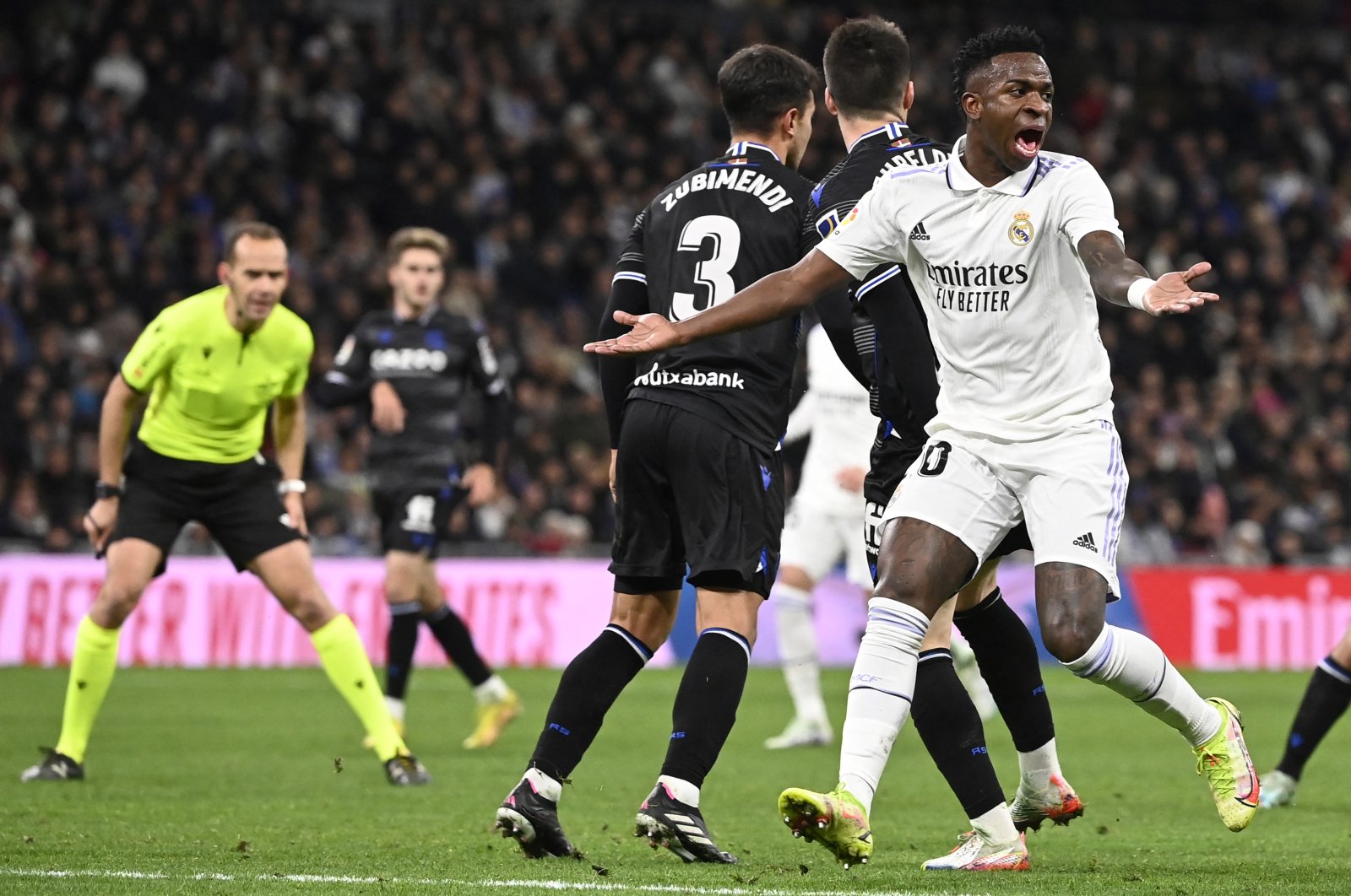Real Madrid&#039;s forward Vinicius Junior reacts during the Spanish league match between against Real Sociedad at the Santiago Bernabeu stadium, Madrid, Spain, Jan. 29, 2023. (AFP Photo)