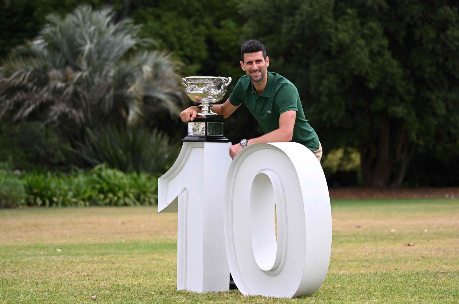 Serbia&#039;s Novak Djokovic poses with the Norman Brookes Challenge Cup trophy, Melbourne, Australia, Jan. 30, 2023. (AFP Photo)