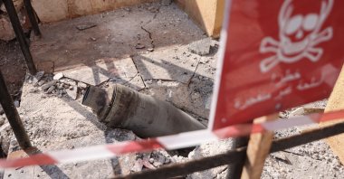 Remnants of a cluster missile from a bombing raid that killed at least six, including children, and wounded at least 20 when Syrian regime forces targeted opposition-held areas, including the Maram camp for internally displaced people, near the village of Kafr Jales, Syria, Nov. 6, 2022 (Reuters Photo)