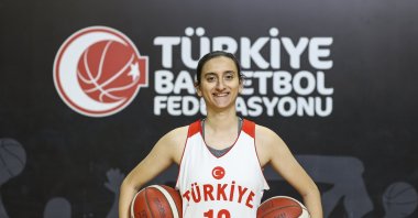 Deaf women's national basketball team captain Esin Bilgili poses for a photo before an interview at the Türkiye Basketball Federation HQ, Istanbul, Türkiye, Jan. 31, 2023. (AA Photo)