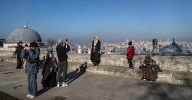 Tourists visit the courtyard of the Süleymaniye Mosque on a sunny day in Istanbul, Türkiye, January 2023. (EPA Photo)