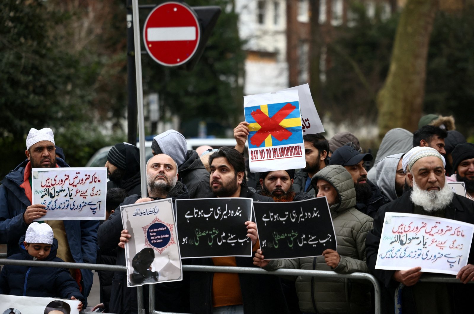 People attend a protest following the burning of the Quran in Stockholm, outside the Swedish Embassy in London, Britain, Jan. 28, 2023. (Reuters Photo)