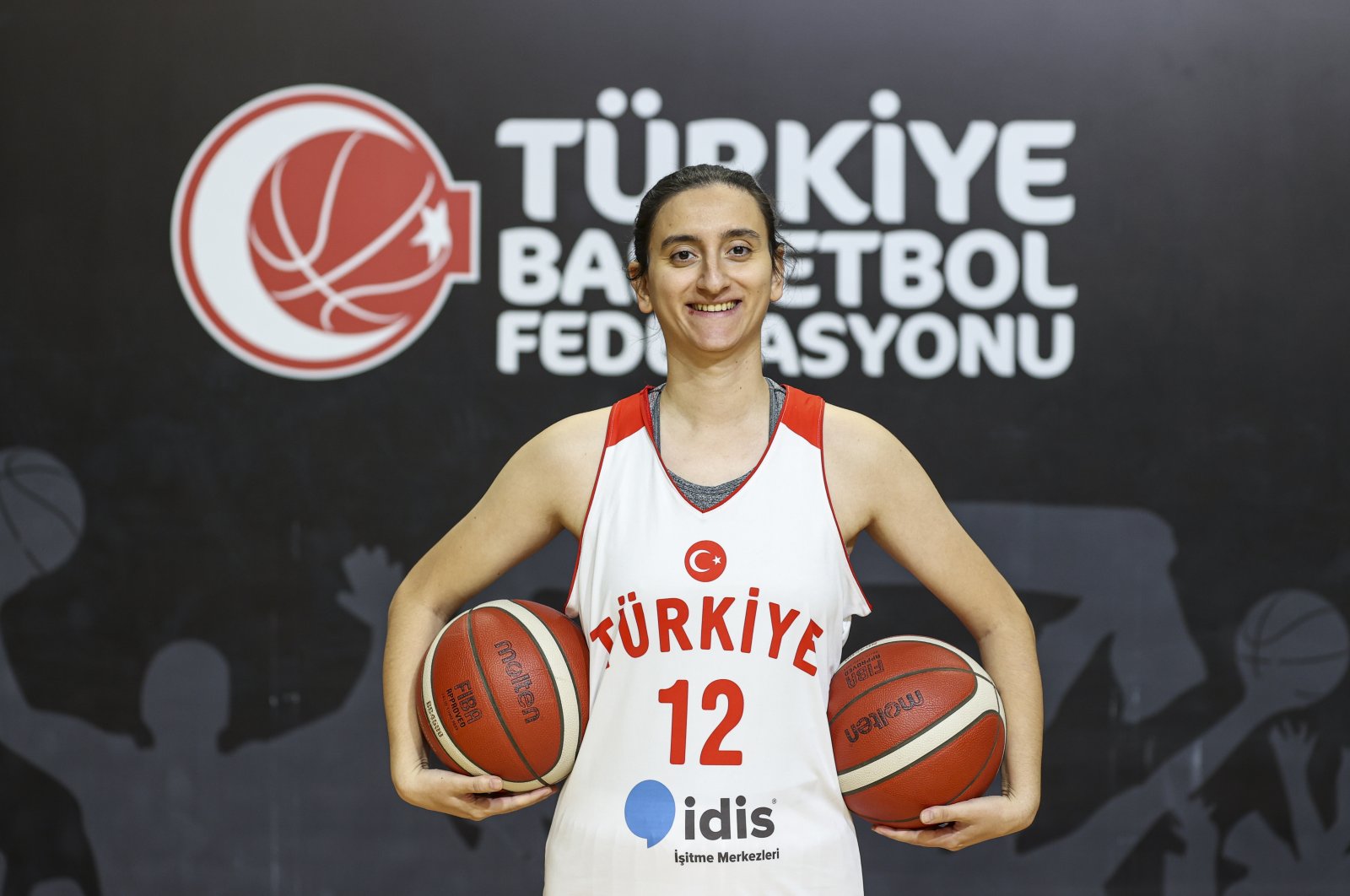 Deaf women&#039;s national basketball team captain Esin Bilgili poses for a photo before an interview at the Türkiye Basketball Federation HQ, Istanbul, Türkiye, Jan. 31, 2023. (AA Photo)