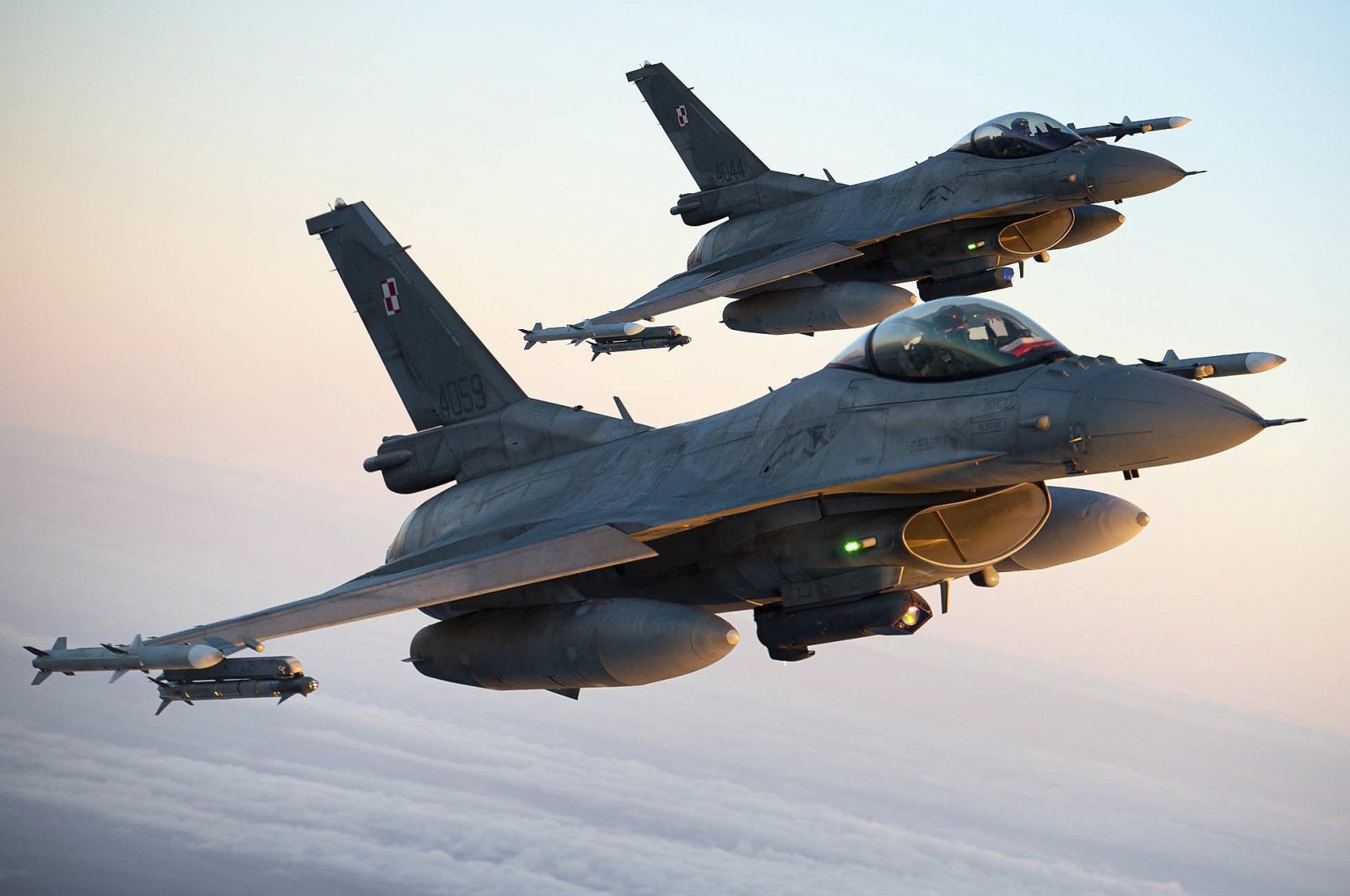 Polish Air Force F-16 fighter jets participate in a NATO mission over Lithuania, Jan. 25, 2022. (AP Photo)