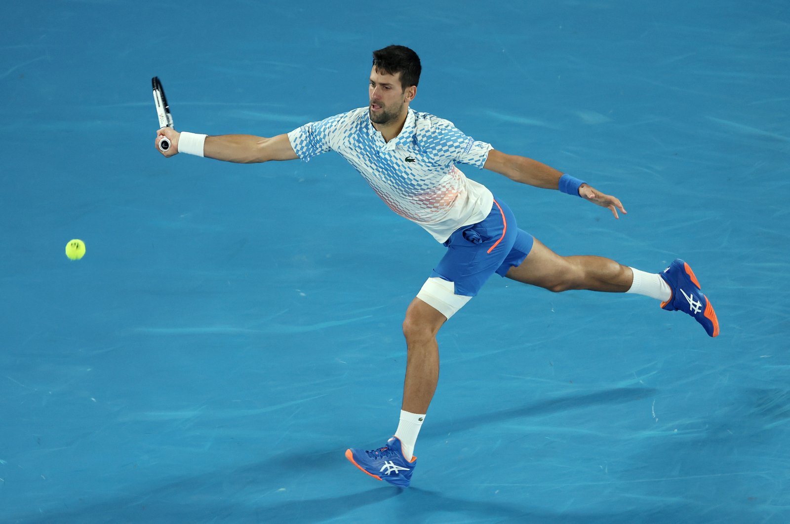 Serbia&#039;s Novak Djokovic plays a forehand in the quarterfinal singles match against Andrey Rublev during Day Ten of the 2023 Australian Open at Melbourne Park, Melbourne, Australia, Jan. 25, 2023. (Getty Images Photo)