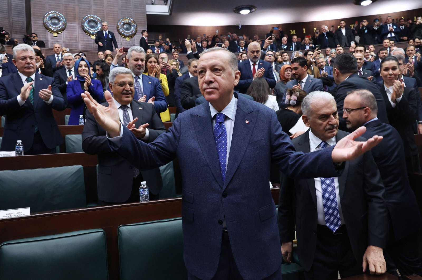 President Recep Tayyip Erdoğan gestures as he arrives at the parliamentary group meeting, in the capital Ankara, Türkiye, Feb. 1, 2023. (AFP Photo) 
