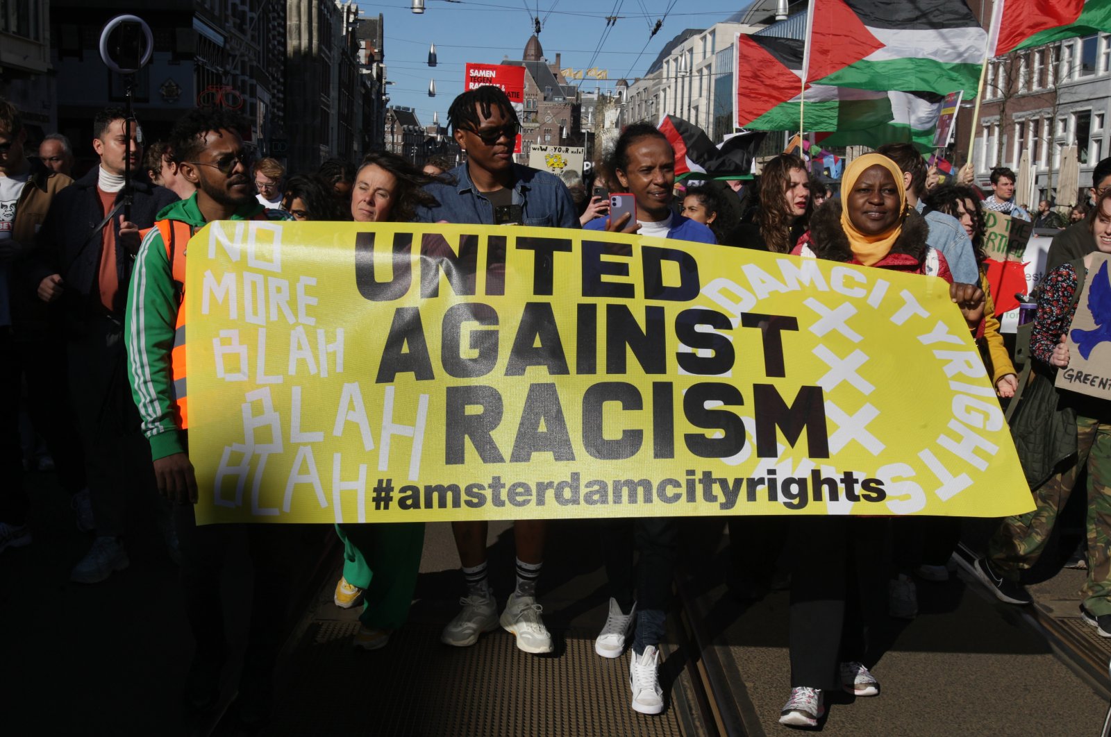 Activists and supporters take part during the Together Against Racism march protest on March 19, 2022, in Amsterdam, Netherlands. (Reuters File Photo)