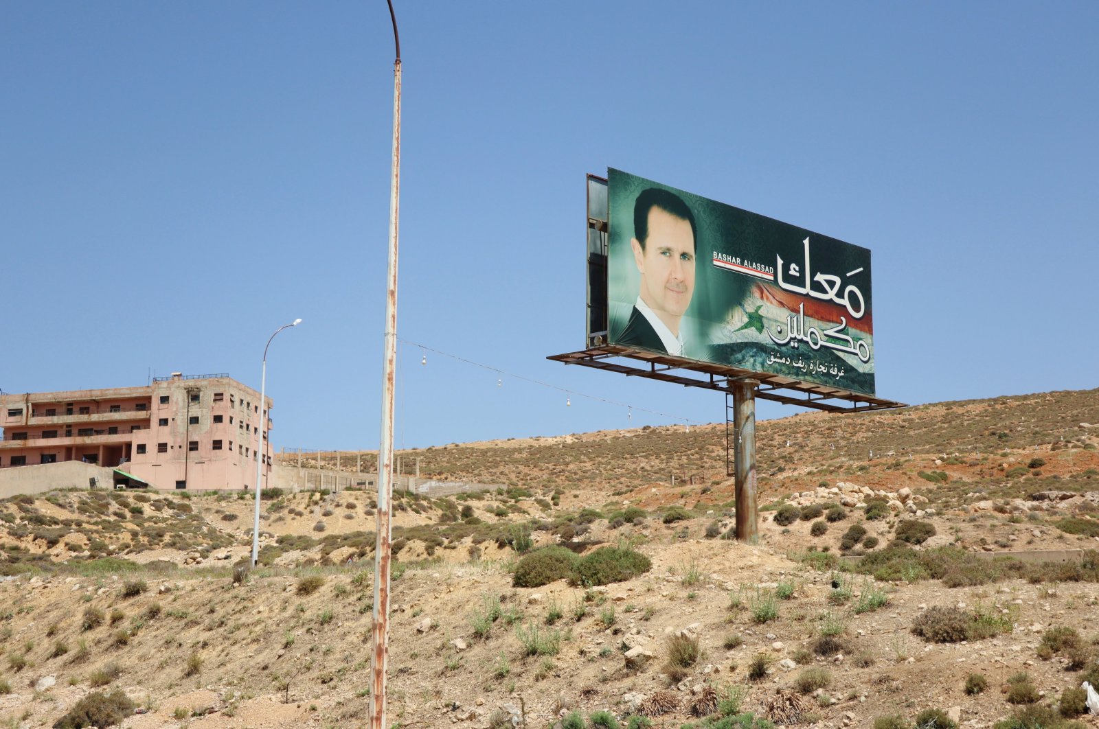 A portrait of Syria&#039;s Bashar Assad along the way from Beirut to Damascus, Jdita, Syria, June 17, 2022 (Reuters Photo)