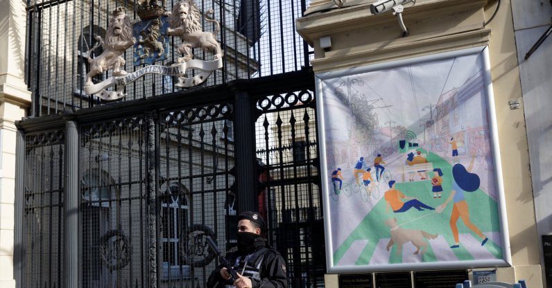 A Turkish police officer stands guard in front of the closed Dutch Consulate in Istanbul, Türkiye, Feb. 1, 2023. (Reuters Photo)