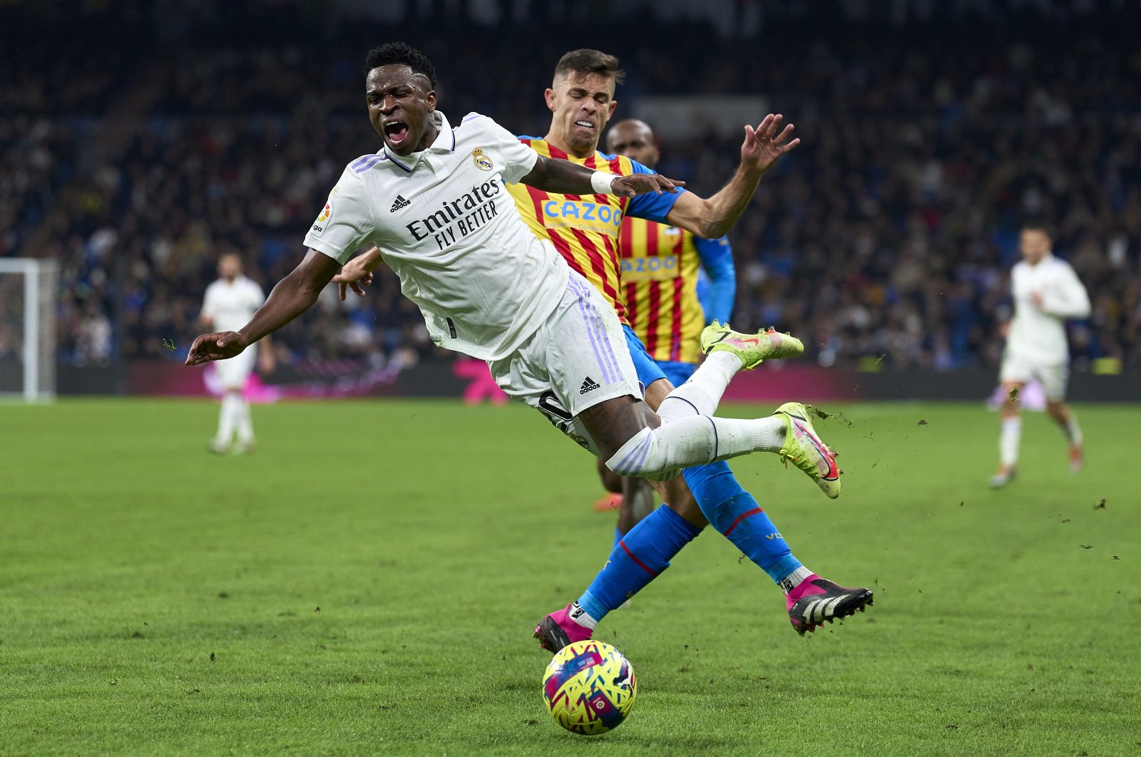 Real Madrid&#039;s Vinicius Junior (L) is tackled by Gabriel Paulista (R) of Valencia CF during the LaLiga Santander match at the Estadio Santiago Bernabeu, Madrid, Spain, Feb. 2, 2023. (Getty Images Photo)