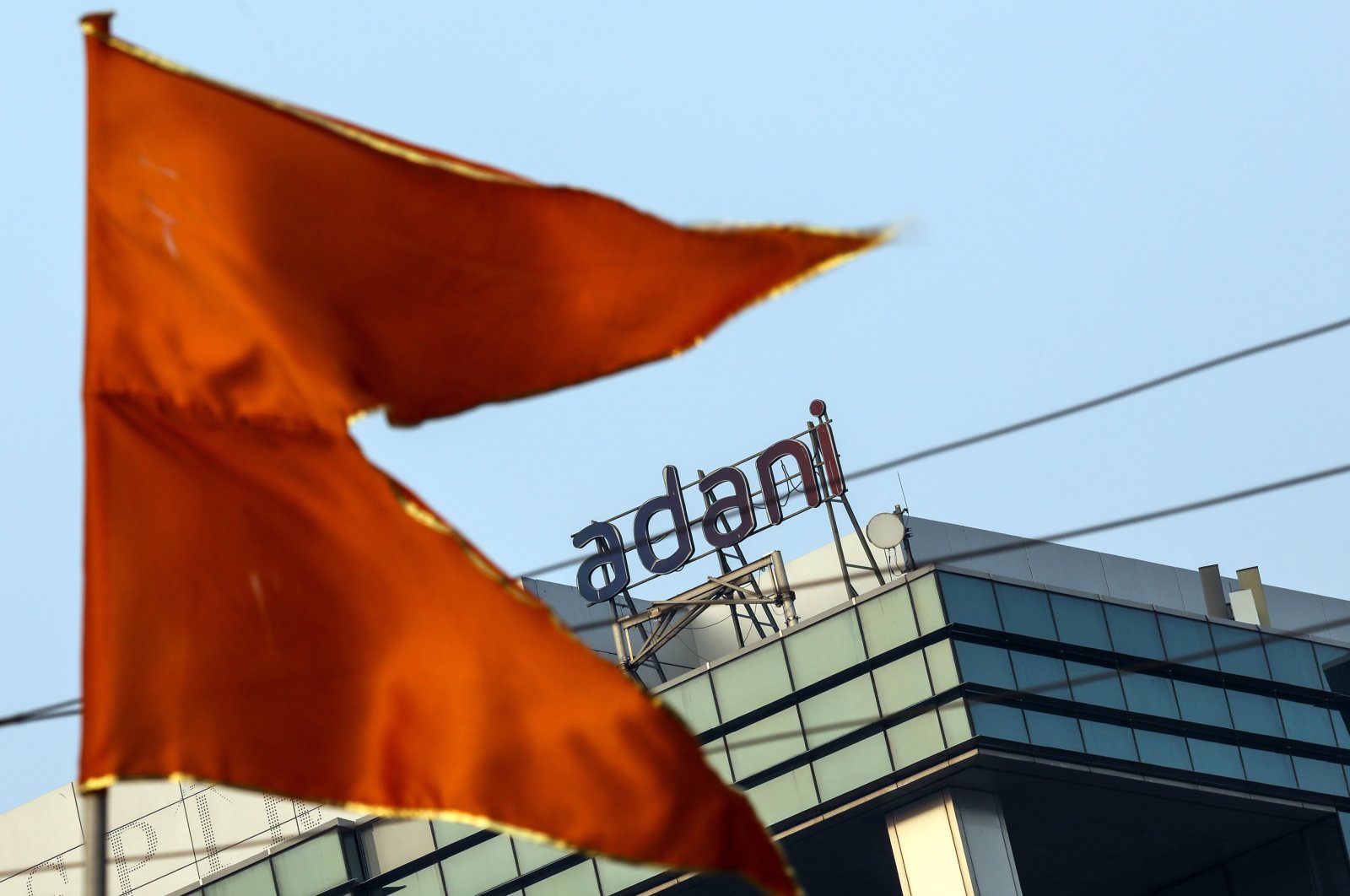 The logo of Adani Group atop a building in Mumbai, India, Feb. 2, 2023. (EPA Photo)
