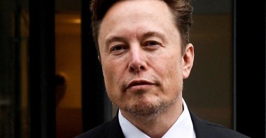 Tesla CEO Elon Musk and his security detail depart the company’s local office in Washington, U.S., Jan. 27, 2023. (Reuters Photo)