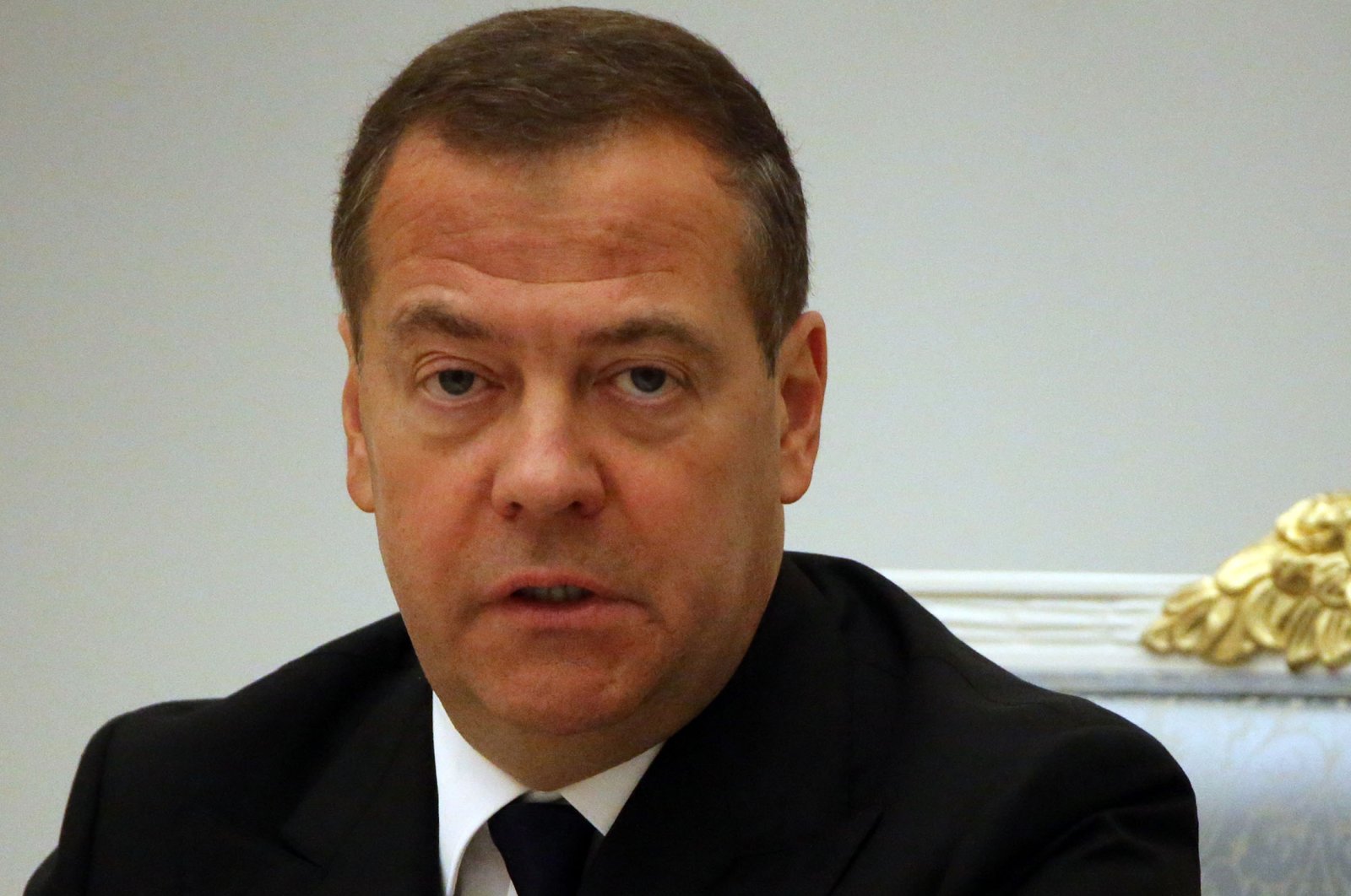 Russian Security Council Deputy Chairman and former President Dmitry Medvedev smiles during a meeting on the military-industrial complex at the Kremlin, in Moscow, Russia, Sept. 20, 2022. (Getty Images)