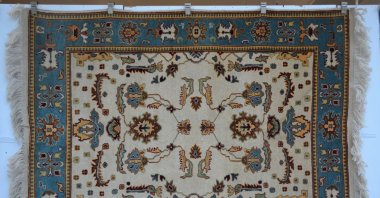 One of the handmade Uşak carpets is displayed in the exhibition, Lefkoşa (Nicosia), TRNC, Feb. 3, 2022. (Photo courtesy of Near East University)