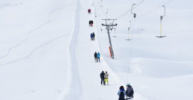 Professional and novice skiers skiing with snowboards at Merga Bütan Ski Center, Hakkari, Türkiye, Feb. 5, 2023. (AA Photo)