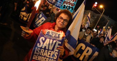 Israeli protesters attend a rally against controversial government plans to give lawmakers more control of the judicial system, Tel Aviv, Israel, Feb. 4, 2023. (AFP Photo)