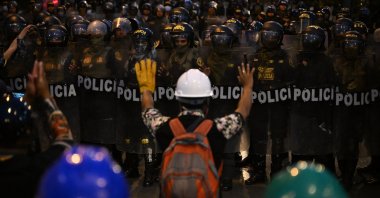 Protesters clash with the police during a demonstration against the government of Peruvian President Dina Boluarte, Lima, Peru, Feb. 4, 2023. (AFP Photo)