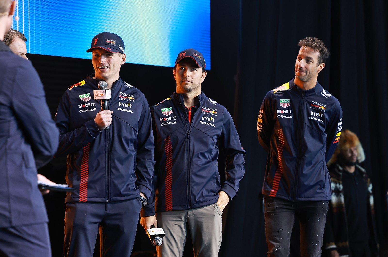 Netherlands&#039; Max Verstappen and Oracle Red Bull Racing talk on stage next to Sergio Perez of Mexico and Oracle Red Bull Racing and Daniel Ricciardo of Australia and Oracle Red Bull Racing during the Oracle Red Bull Racing Season Launch 2023 at Classic Car Club Manhattan, New York City, Feb. 3, 2023. (Getty Images Photo)