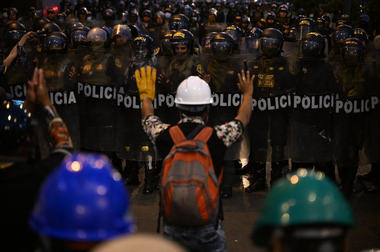 Protesters clash with the police during a demonstration against the government of Peruvian President Dina Boluarte, Lima, Peru, Feb. 4, 2023. (AFP Photo)