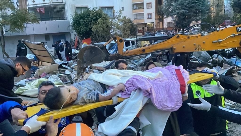 A child was rescued in Adana after an earthquake hit Kahramanmaraş, Feb. 6, 2023. (AA Photo)