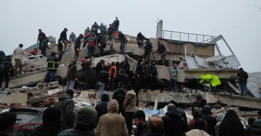 Search and rescue teams search the rubble of a building destroyed by the earthquake, Kahramanmaraş, Türkiye, Feb. 6, 2023. (IHA Photo)
