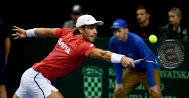 Croatia&#039;s Borna Coric returns the ball during his match against Austria&#039;s Dominic Thiem, during their Davis Cup qualifying tennis match between Croatia and Austria, Rijeka, Croatia, Feb. 5, 2023. (AFP Photo)