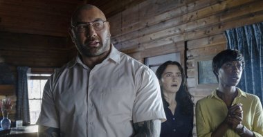 This image released by Universal Pictures shows (L-R) Dave Bautista, Abby Quinn, and Nikki Amuka-Bird in a scene from "Knock at the Cabin." (AP Photo)