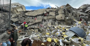 Search and rescue work is being carried out in the wreckage with the support of soldiers, Coast Guard Command teams, AKUT and citizens, Iskenderun, Türkiye, Feb. 6, 2023. (AA Photo)