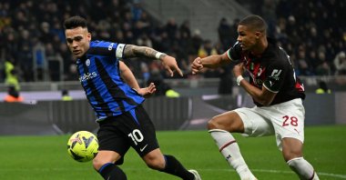 Inter Milan's Argentinian forward Lautaro Martinez outruns AC Milan's German-Finnish defender Malick Thiaw (R) during the Italian Serie A football match between Inter and AC Milan, at the San Siro stadium, Milan, Italy, Feb. 5, 2023. (AFP Photo)