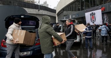 Beşiktaş fans bringing relief aid items for Kahramanmaraş earthquakes victims to the fundraising area established in Vodafone Park, Istanbul, Türkiye, Feb. 7, 2023. (AA Photo)