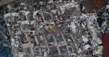An aerial view of a collapsed building following an earthquake in Hatay, Türkiye, Feb. 7, 2023. (Reuters Photo)