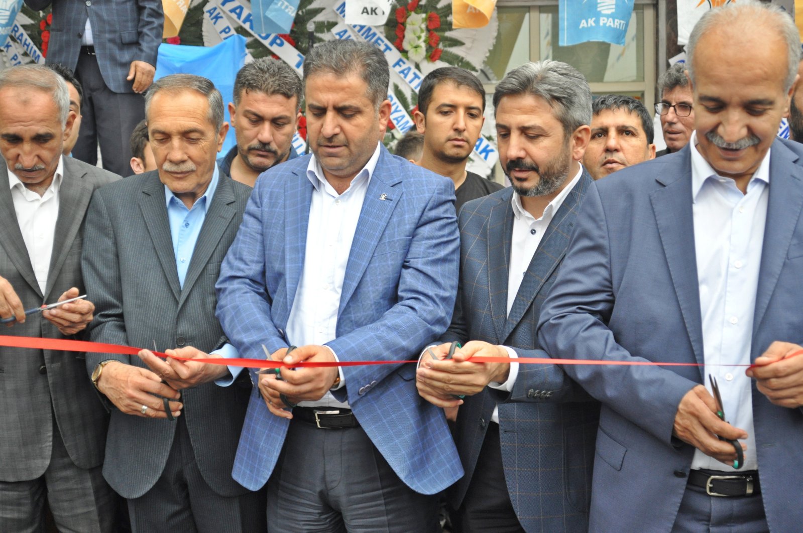 The body of AK Party deputy Yakup Taş, who was in the wreckage in the earthquake in Adıyaman, has been reached. Yakup Taş (1-L) is seen here attending the opening of his party&#039;s Election Liaison Office in Gölbaşı district of Adıyaman with Ahmet Aydın (2-R) and AK Party Adıyaman deputy Ibrahim Halil Fırat (3-R), Türkiye, May 28, 2018. (AA File Photo)