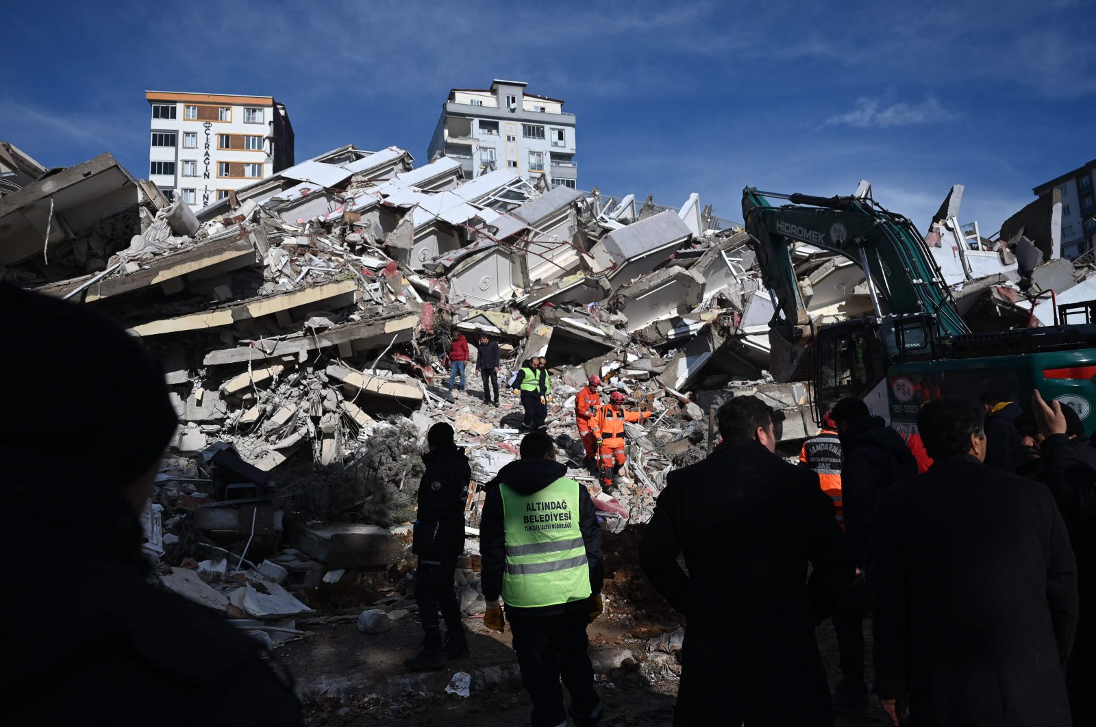 Rescuers carry out search operations through the rubble of collapsed buildings in Kahramanmaraş, Türkiye, Feb. 7, 2023. (AFP Photo)